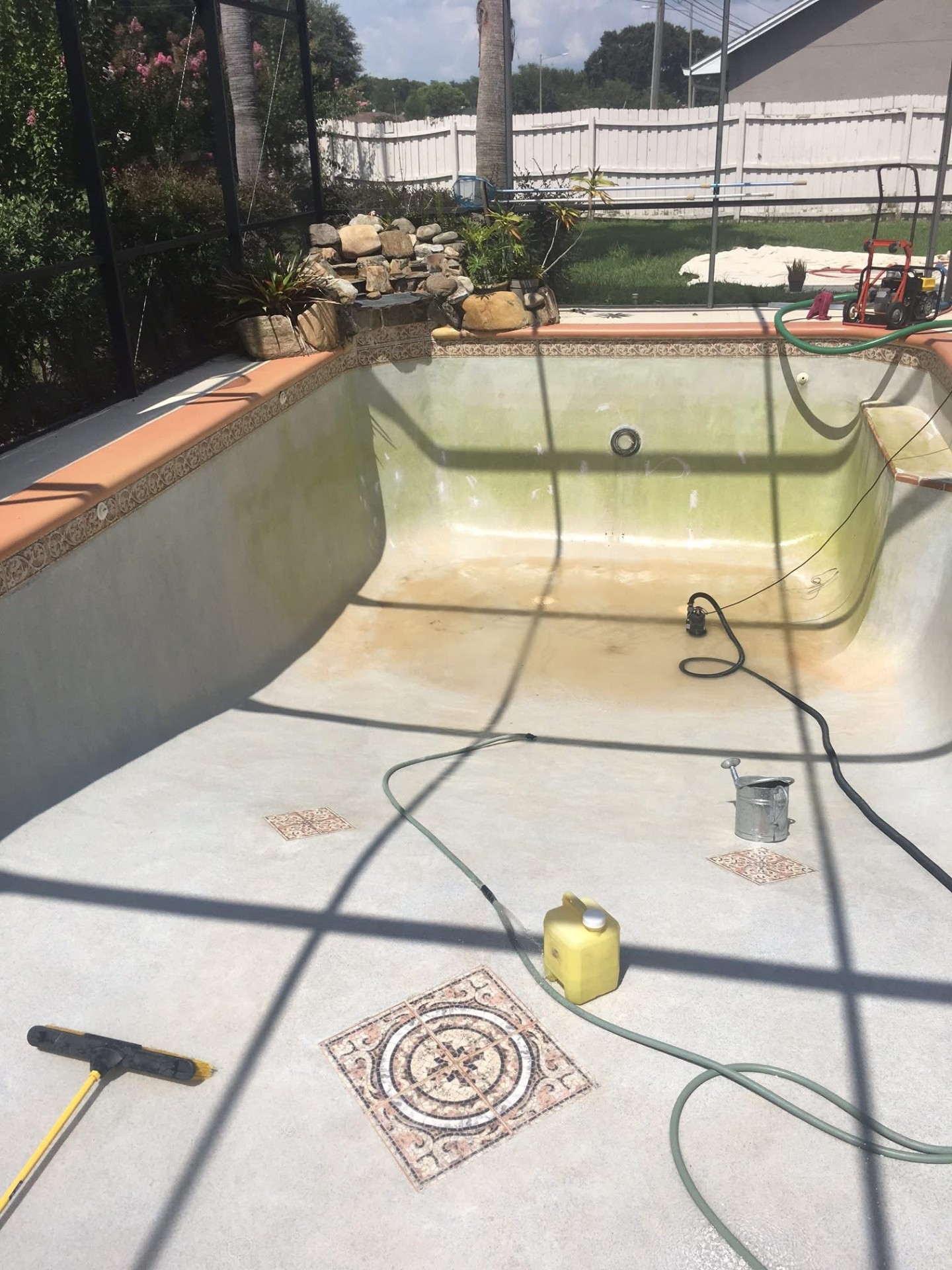 Pool with heavy algae staining needing recovery service