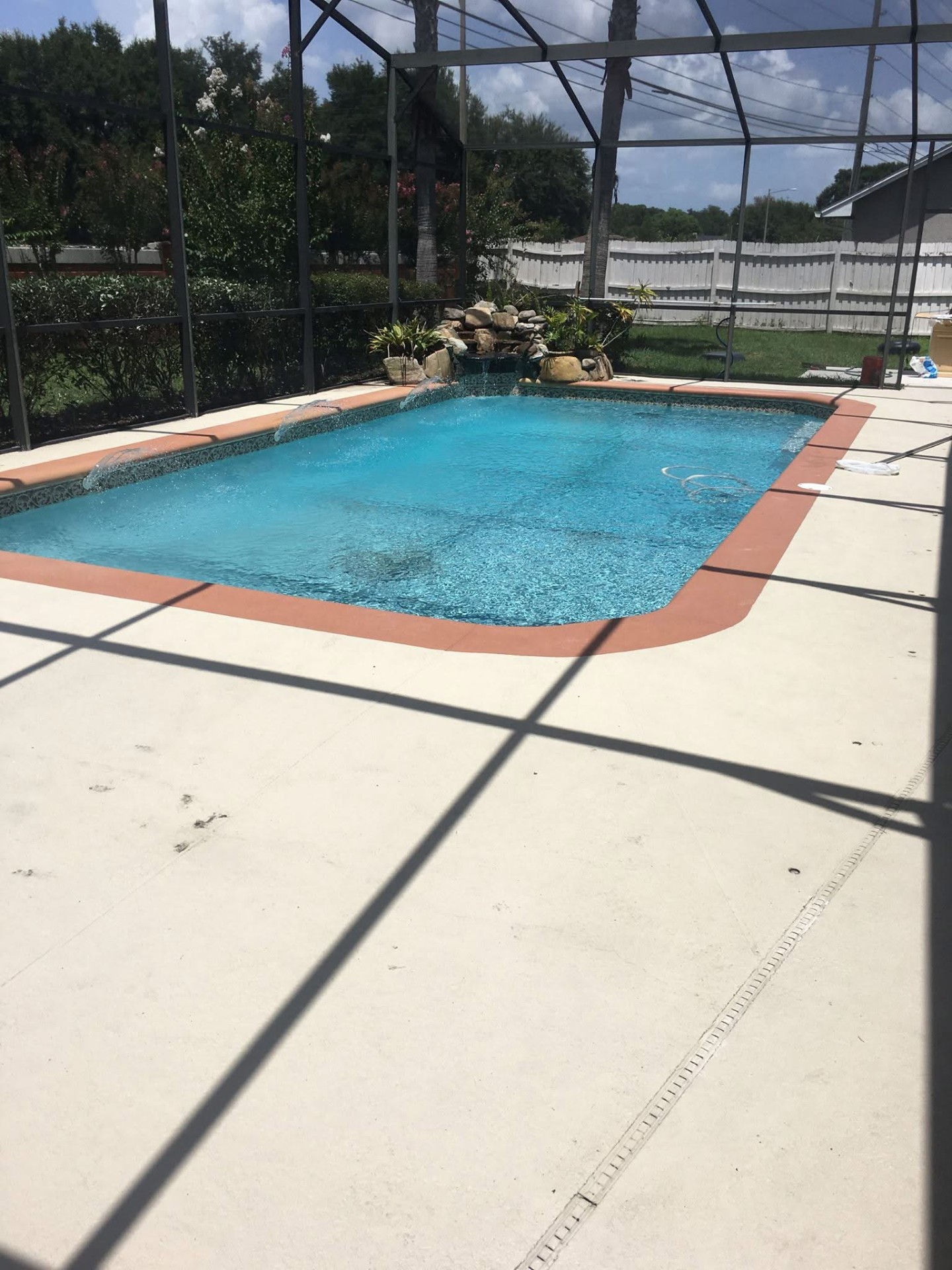 Refilled bright blue pool after Sunny Clean Pool recovery